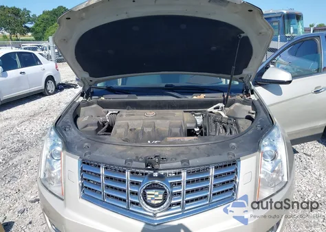 2013 Cadillac Srx Premium Collection z USA, uszkodzony, nr VIN 3GYFNEE33DS532234